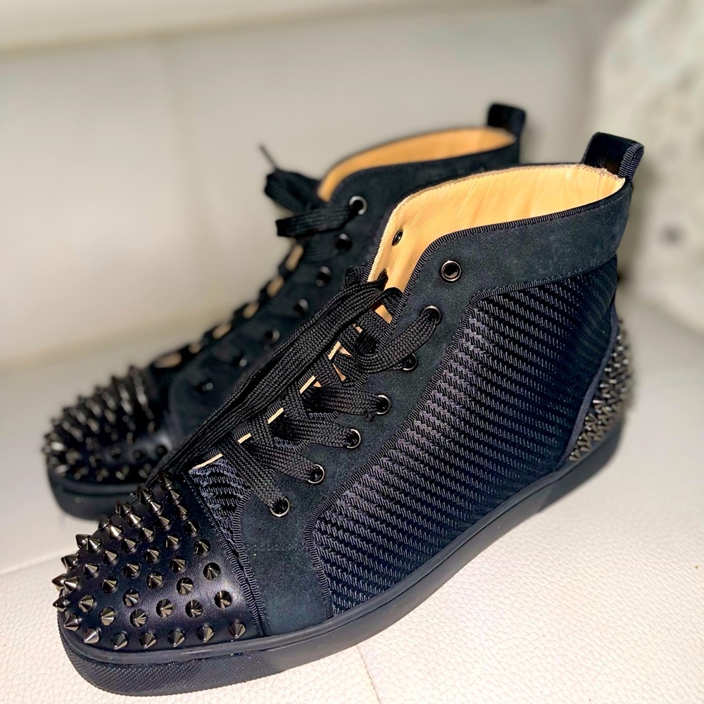 Christian Louboutin
Men's Black Ac Lou Spikes 2 Leather &
Mesh Sneaker black
